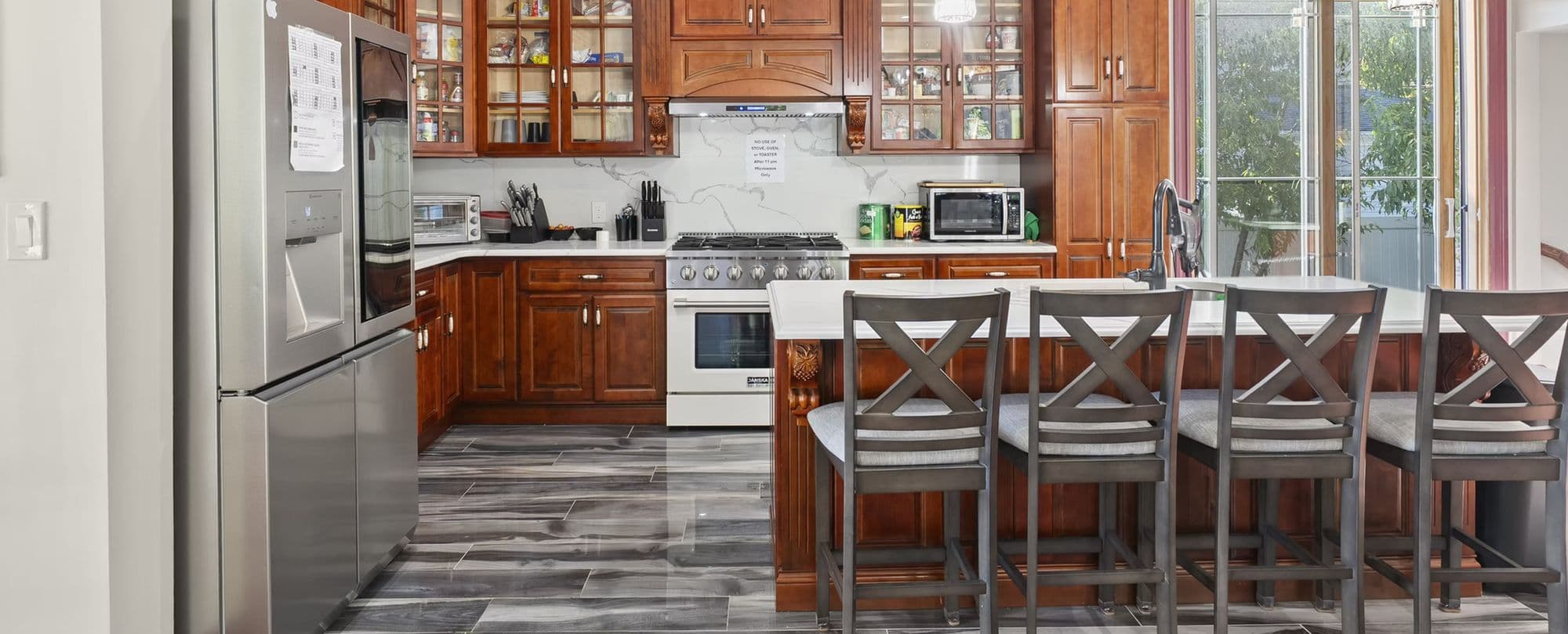 Freeport Sober House — Kitchen | Long Island Sober Living | Integrity Sober Homes Shared kitchen at Integrity Sober Homes men's sober living house on N Long Beach Road in Freeport, Long Island