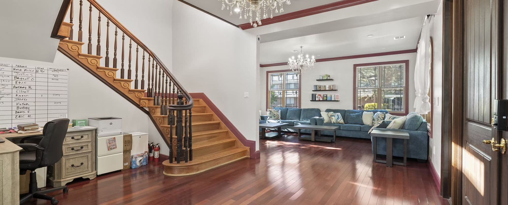 Freeport Sober House — Living Room (peer-support recovery housing) | Long Island Sober Living | Integrity Sober Homes Shared living room with peer-support seating at Integrity Sober Homes men's sober house on N Long Beach Road in Freeport — Long Island recovery housing