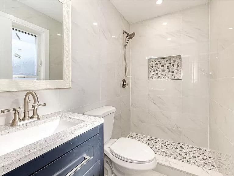 Uniondale Sober Home — Bathroom | Long Island Sober Living | Integrity Sober Homes Bathroom at Integrity Sober Homes men's sober living house on Van Buren in Uniondale, Long Island — Nassau County recovery housing